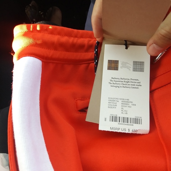 Red Burberry jogger pants